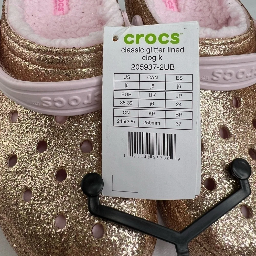 CROCS - ‘Gold Glitter & Pink’ Classic lined. SZ: J6. NWT Firm!